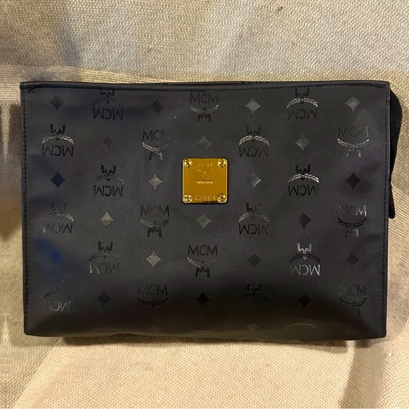 MCM Handbags - MCM Clutch